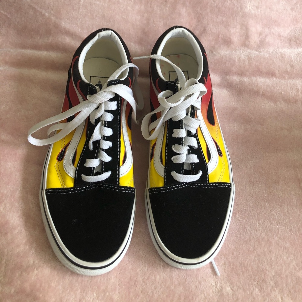 Super cool fire vans. Black suede on toe and heel. Barely worn.